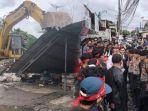 pengadilan-eksekusi-sejumlah-rumah-di-Desa-Setia-Mekar-Bekasi-warga-protes.jpg