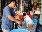 penggunaan-aplikasi-peduli-lindungi-dalam-transaksi-jual-beli-minyak.jpg