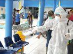 penyemprotan-disinfektan-di-ruang-tunggu-terminal-trenggalek.jpg