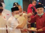 plt-ketua-dpd-psi-surabaya-yusuf-lakaseng-bersama-calon-wali-kota-surabaya-eri-cahyadi.jpg