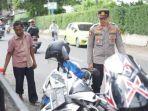 polisi-saat-melakukan-olah-tkp-lokasi-pencurian-sepeda-motor-di-sebuah-cafe.jpg