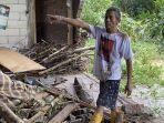 ratapan-Darwin-lihat-rumahnya-jebol-diterjang-banjir.jpg