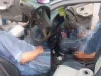 screenshot-video-viral-seorang-pria-meninggal-dunia-di-dalam-mobil-sedan-Nissan.jpg