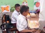 siswa-SD-pilih-bawa-pulang-menu-saat-uji-coba-makan-gratis-untuk-nenek-di-rumah.jpg