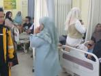 siswi-SMKN-1-Tambakboyo-dirawat-usai-diduga-keracunan-MBG.jpg