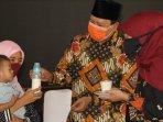 susu-formula-untuk-anak-tenaga-kesehatan-di-kabupaten-pasuruan-ilustrasi-susu-bupati-irsyad-yusuf.jpg