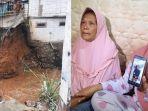 tangis-istri-kuak-detik-detik-suami-terseret-banjir.jpg