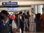 terminal-1-domestik-bandara-juanda-dipadati-ribuan-penumpang-jumat-241221.jpg