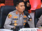 uang-palsu-yang-beredar-di-ngawi-polisi-temukan-dollar-us-dan-Brazillian-Real.jpg