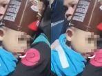 video-viral-kepala-bocah-tersangkut-kaleng-biskuit.jpg