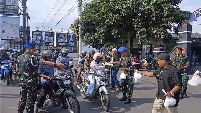 Denpom IV/2 Yka dan BTA Nusantara Berbagi 'Jumat Berkah' di Jalan Magelang Jogja