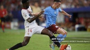 Phil-Foden-vs-Tanguy-Nianzou-di-pertandingan-Liga-Champions-Sevilla-vs-Manchester-City.jpg