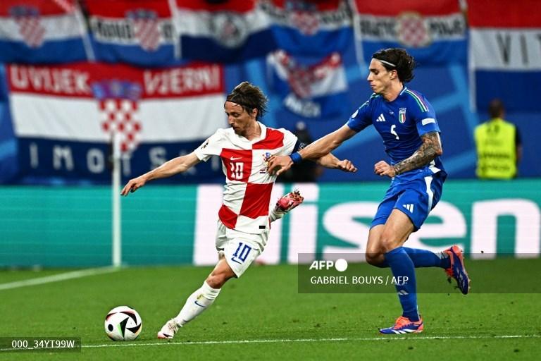 Luka-Modric-vs-Riccardo-Calafiori-di-Euro-2024-antara-Kroasia-vs-Italia-di-Stadion-Leipzig.jpg