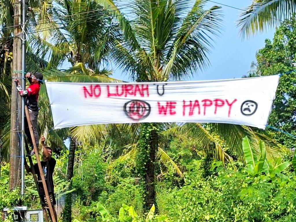 Warga-Garongan-Kembali-Pasang-Spanduk-Sindiran-Kasus-Pungli-Berharap-Lurah-Segera-Jadi-Tersangka.jpg