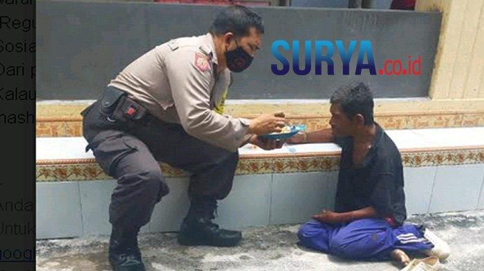 kisah-inspiratif-bripka-sodik-telaten-suapi-gelandangan-yang-kelaparan-di-pinggir-jalan-di-kediri.jpg
