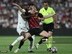 Antonio-Rudiger-vs-Erling-Haaland-di-Liga-Champions-Real-Madrid-vs-Manchester-City.jpg