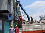 Belum-Berizin-Pemkot-Yogya-Bongkar-30-Tiang-Pancang-Fiber-Optik.jpg