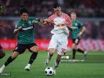 Benjamin-Sesko-vs-Genki-Haraguchi-di-Bundesliga-Jerman-antara-RB-Leipzig-vs-Stuttgart-di-Leipzig.jpg