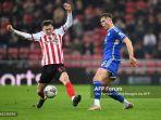 Chris-Rigg-vs-Callum-Doyle-di-Championship-Sunderland-vs-Leicester-City.jpg