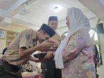 Kementerian-Kelautan-dan-Perikanan-Bagikan-Makanan-Bergizi-Gratis-di-SMP-Ali-Maksum-Jogja.jpg