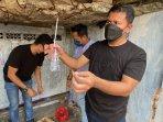 Penggerebekan-di-Kampung-Boncos-Polisi-Datang-Orang-orang-Berhamburan.jpg