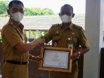 Penghargaan-pada-Panewu-Patuk-Martono-Imam-Santoso.jpg