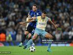 Rodri-vs-Hakan-Calhanoglu-di-Liga-Champions-antara-Manchester-City-vs-Inter-Milan-di-Etihad.jpg