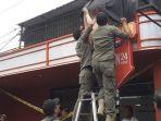 Satpol-PP-Kota-Jogja-menindak-toko-miras-tidak-berizin.jpg