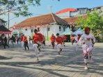 Teras-Malioboro-1-Gelar-Senam-Merah-Putih-hingga-Bagi-bagi-Nasi-Berkat.jpg