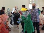 anggota-komisi-ix-dpr-ri-melakukan-screening-tes-covid-19.jpg