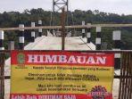 cegah-penularan-virus-corona-pemerintah-desa-sriharjo-dan-selopamioro-tutup-jembatan-gantung.jpg