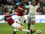 declan-rice-of-west-ham-in-action-with-paul-pogba_20180511_041218.jpg
