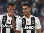 dua-penyerang-juventus-mario-mandzukic-dan-cristiano-ronaldo_20181006_164358.jpg