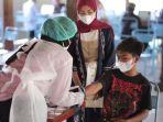 gandeng-polri-ugm-gelar-vaksinasi-covid-19-massal-bagi-warga-di-sekitar-hutan-wanagama.jpg