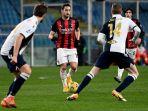 hakan-calhanoglu-saat-serie-a-italia-sampdoria-vs-ac-milan-di-stadion-luigi-ferrari-di-genoa.jpg