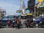 humas-rsup-dr-sardjito-saat-membagikan-masker-di-simpang-empat-kentungan_20180511_124506.jpg
