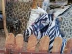 keledai-dicat-supaya-terlihat-seperti-zebra_20180730_100723.jpg