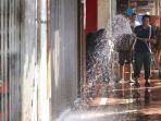 kerja-bhakti-di-kawasan-malioboro_2011_20170925_184743.jpg