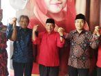 ketua-dpc-pdip-joko-purnomo-tengah-bergandengan-tangan-bersama-bakal-calon-bupati-bantul.jpg