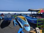 libur-sekolah-usai-kunjungan-wisatawan-ke-pantai-depok-menurun-tajam_20180716_170202.jpg