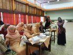 para-ibu-anggota-dharma-wanita-setda-kota-magelang-mengikuti-pelatihan-menyulam-pita.jpg