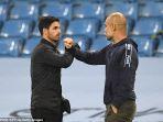pelatih-arsenal-mikel-arteta-dan-pelatih-manchester-city-pep-guardiola.jpg