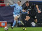 phil-foden-dan-nico-elvedi-di-babak-16-besar-borussia-moenchengladbach-vs-manchester-city.jpg