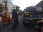 sabtu-siang-simpang-empat-titik-nol-kilometer-yogyakarta-terpantau-ramai_20180811_112816.jpg