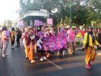 sejumlah-komunitas-batik-melakukan-long-march-di-sepanjang-jalan-malioboro.jpg