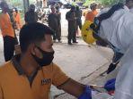 tenaga-kebersihan-dlh-gunungkidul-saat-mengikuti-pemeriksaan-rapid-test-rabu-24062020.jpg