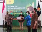 wagub-diy-kgpaa-paku-alam-x-menyerahkan-secara-paket-berisi-masker-rompi-dan-kaos.jpg