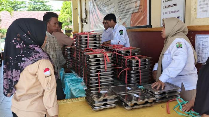 PENDISTRIBUSIAN MBG- SPPG Nunukan menyiapkan pendistribusian Makanan Bergizi (MBG) untuk sekolah, ibu hamil, ibu menyusui, dan balita selama Ramadan, dengan pengiriman langsung, pengambilan di dapur, atau delivery ke titik serah terima.