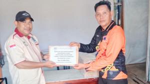 111025-PT-SIL-SIP-beri-bantuan-untuk-korban-kebakaran-Desa-Mansalong.jpg