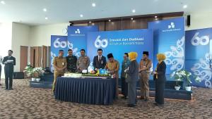 Prosesi-potong-tumpeng-dalam-HUT-Bank-KaltimTara.jpg